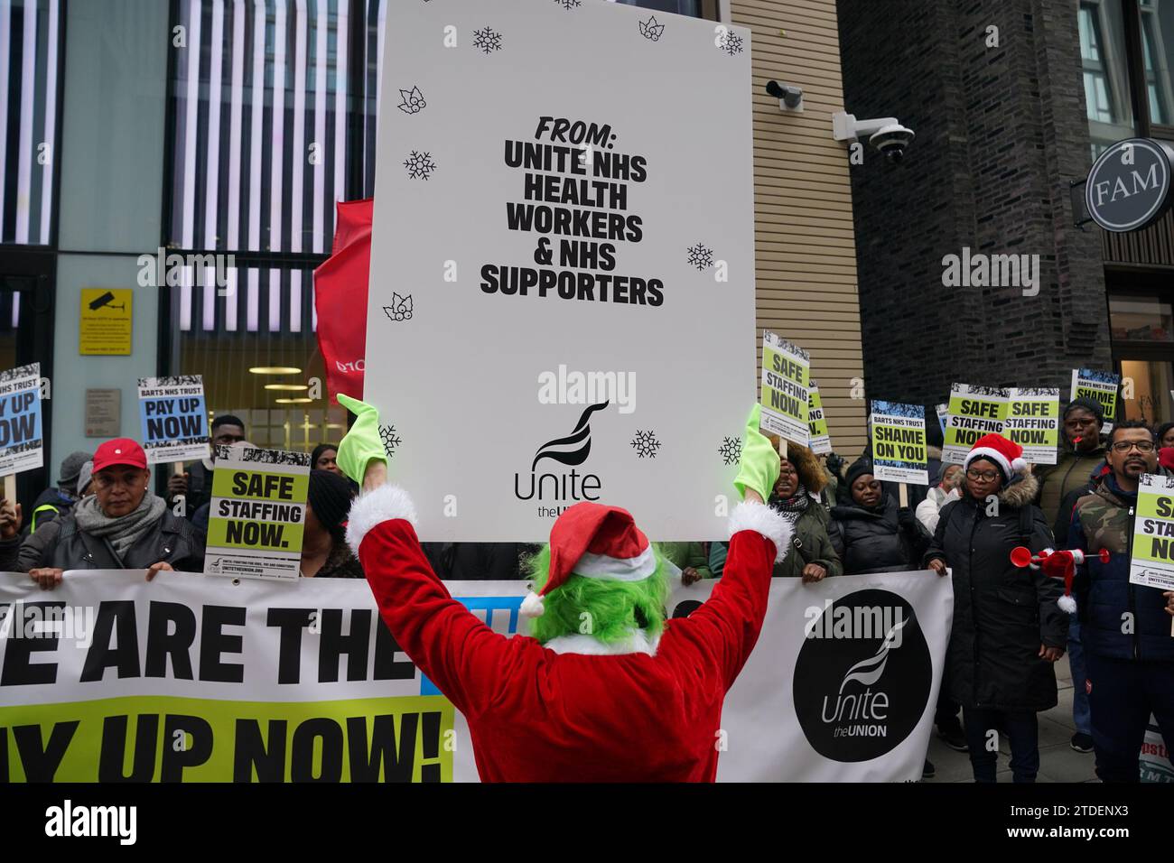 Representatives from unite the union with a member dressed as the