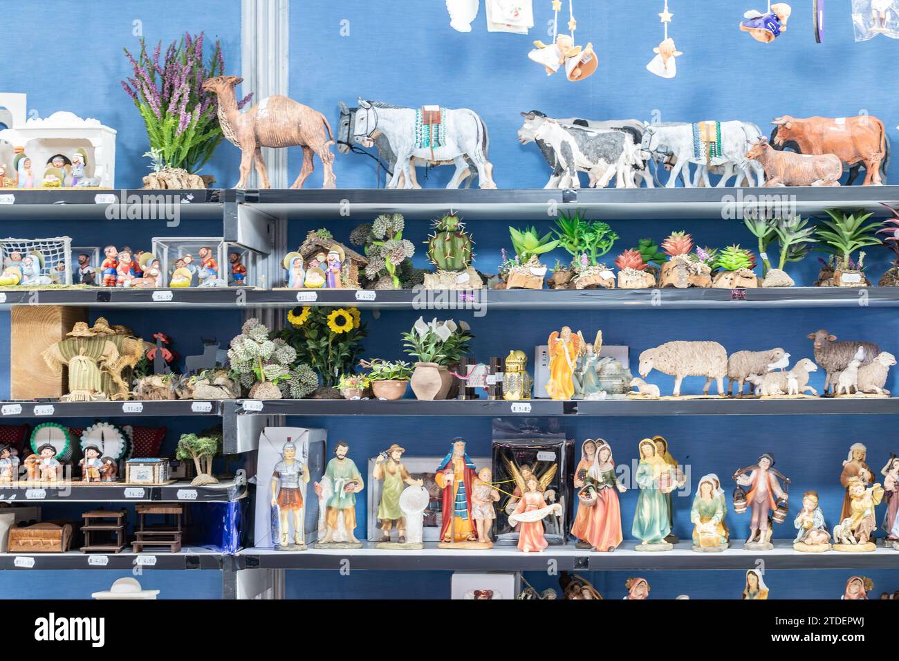 Seville, Spain - December 16, 2023: A stand of typical products for decorating nativity scenes at the traditional Christmas markets Stock Photo