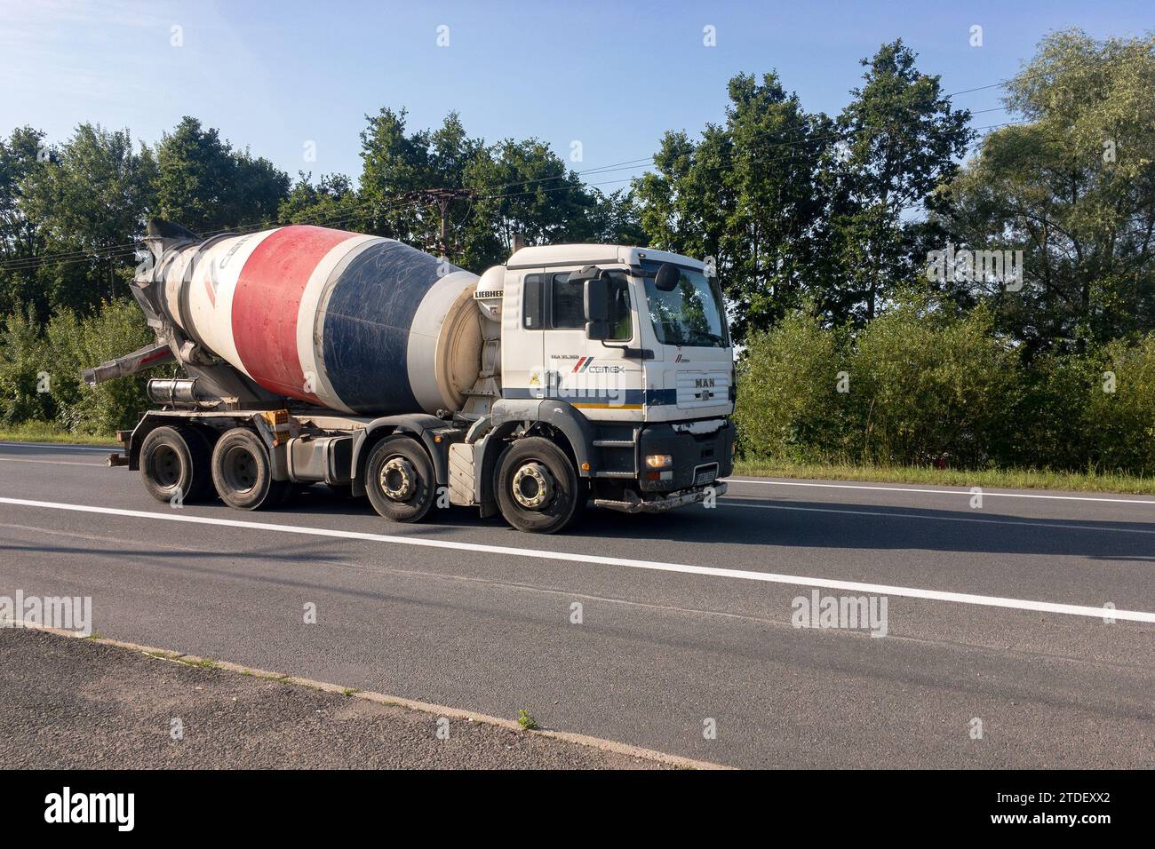 SENOV, CZECH REPUBLIC - JUNE 30, 2023: MAN TGA 35.360 mixer truck of Cemex company delivering concrete Stock Photo