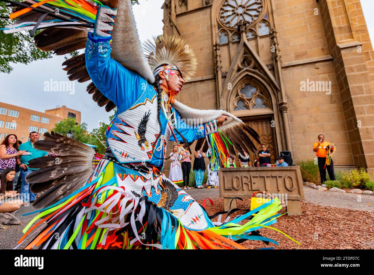 Santa Fe Indian Market participants in traditional regalia perform in downtown Santa Fe, New Mexico, United States of America, North America Stock Photo