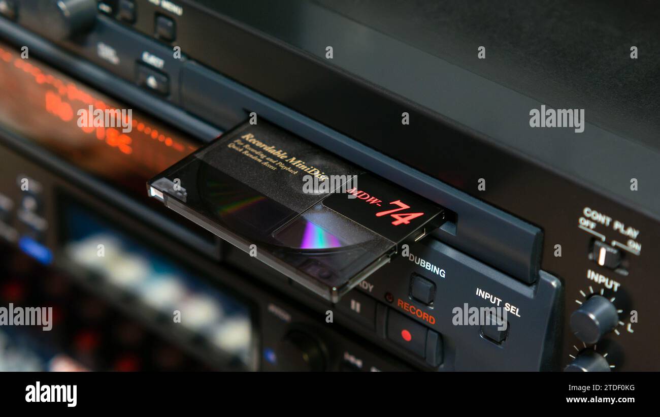 Professional minidisc player with disc ejected from slot Stock Photo