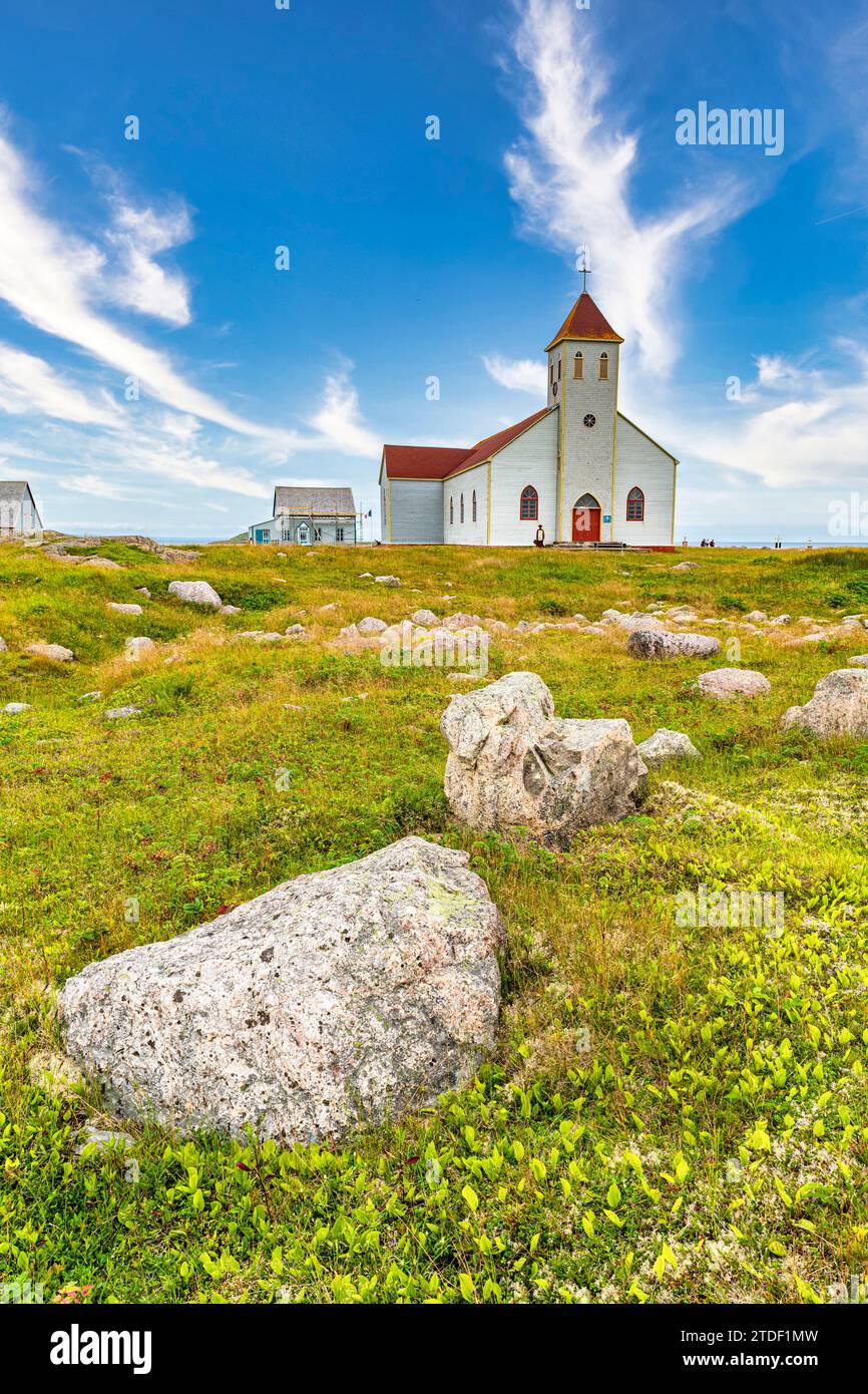 Church and old fishing houses, Ile aux Marins, fishermen's island, Territorial Collectivity of Saint-Pierre and Miquelon Stock Photo