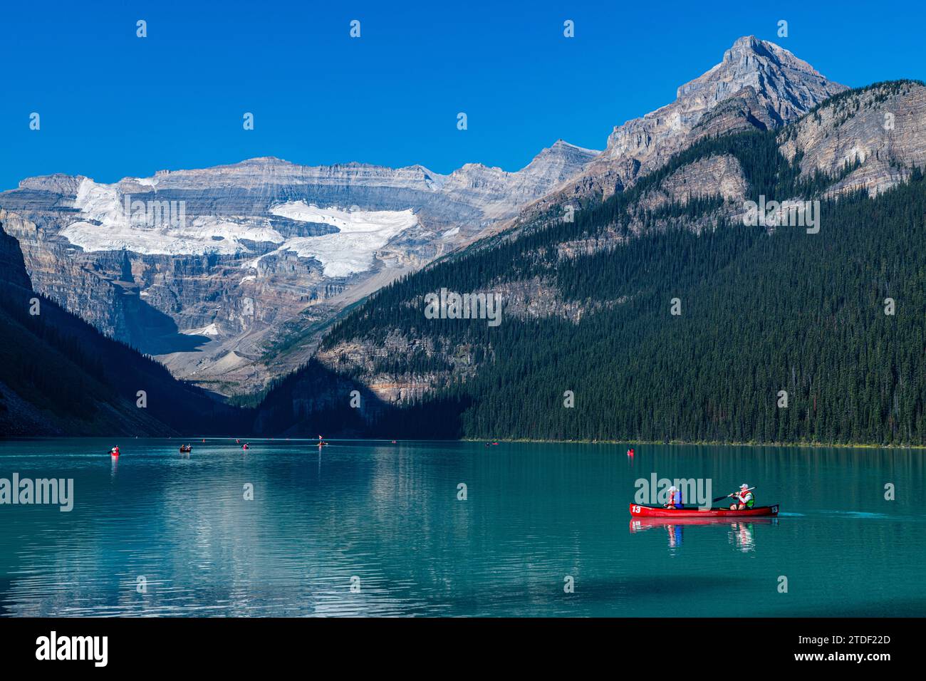 Kayakers on Lake Louise, Banff National Park, UNESCO World Heritage Site, Alberta, Rocky Mountains, Canada, North America Stock Photo