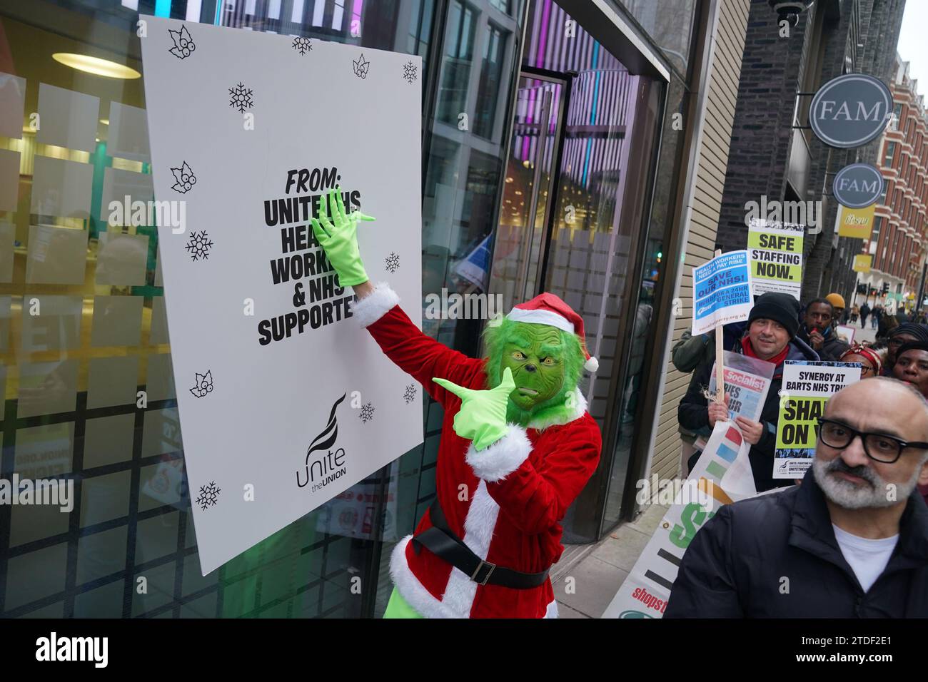 Representatives from unite the union with a member dressed as the