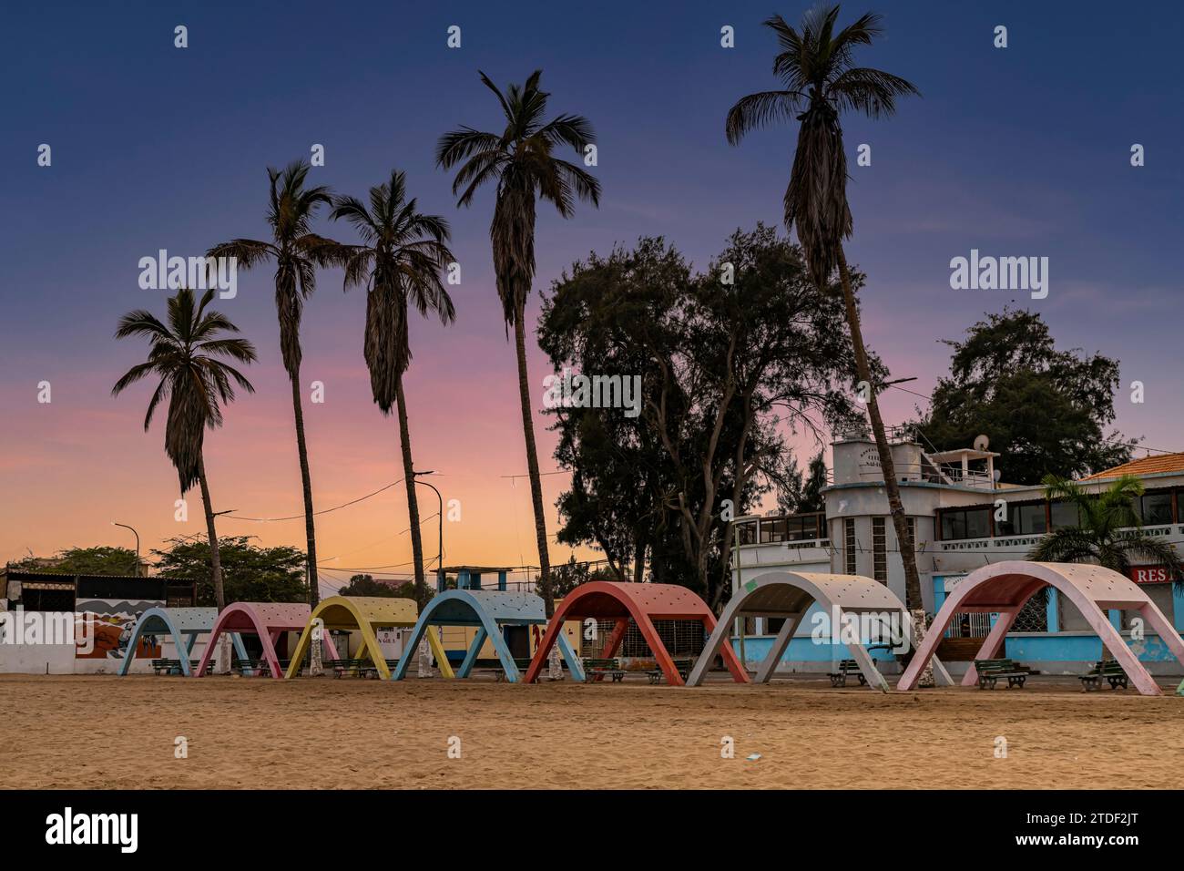 Blue hour over the beach with colonial concrete beach shades in the