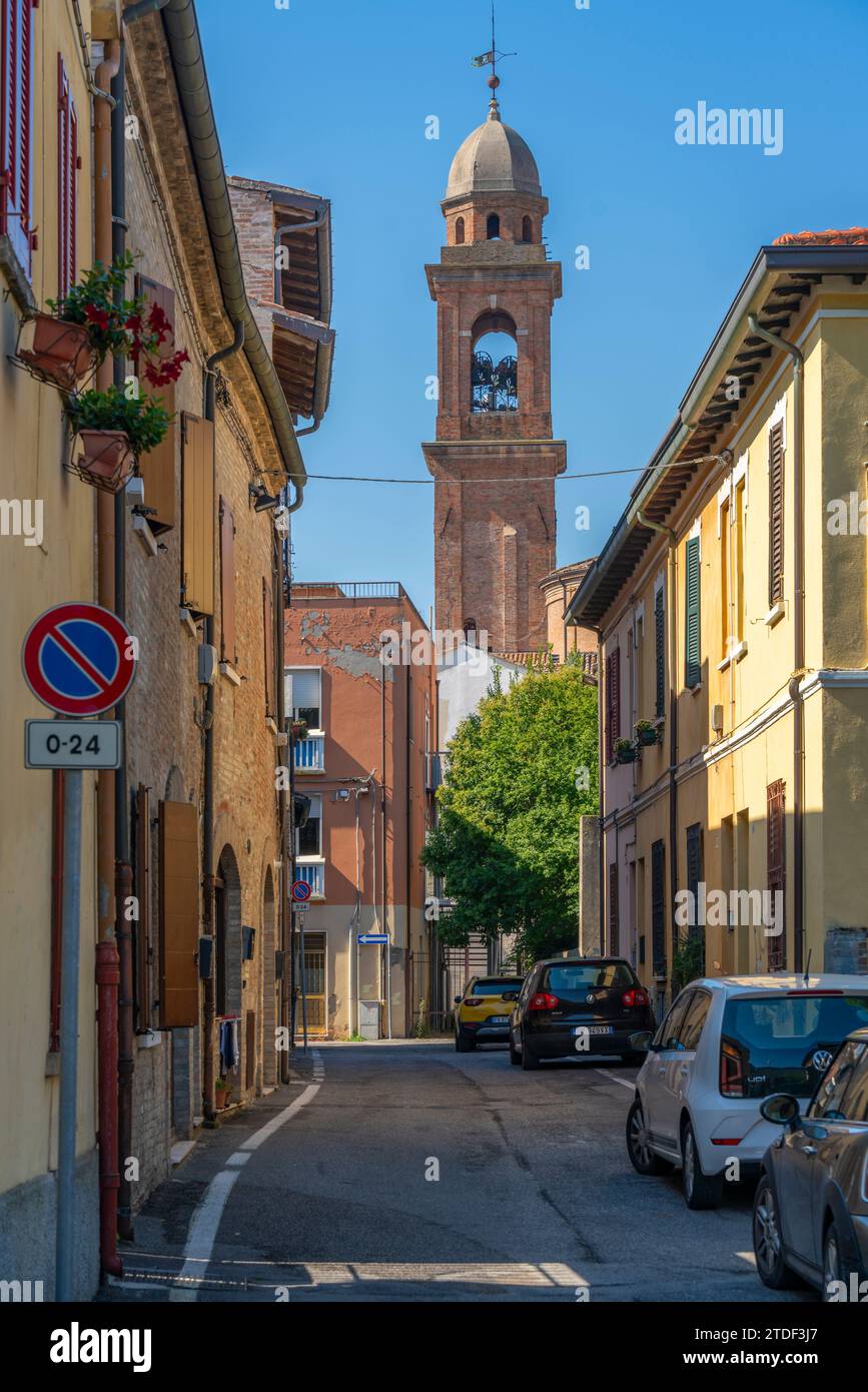 View of church bell tower and narrow street in Rimini, Rimini, Emilia-Romagna, Italy, Europe Stock Photo