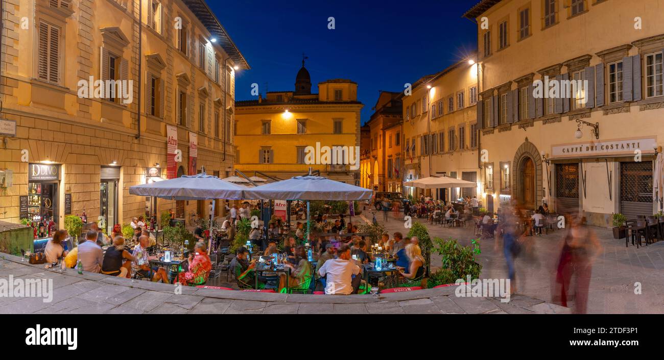View of restaurant in Piazza San Francesco at dusk, Arezzo, Province of Arezzo, Tuscany, Italy, Europe Stock Photo