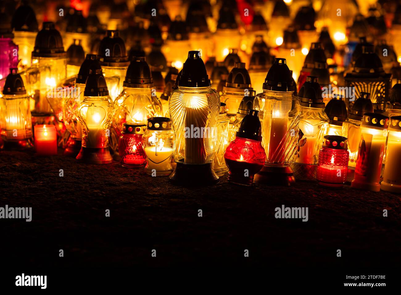 Lots of glass candles burning in the cemetery. A night shot of cemetery