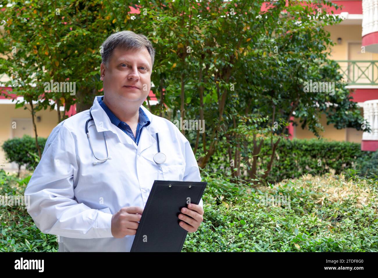 Blond doctor folder documents hi-res stock photography and images - Alamy