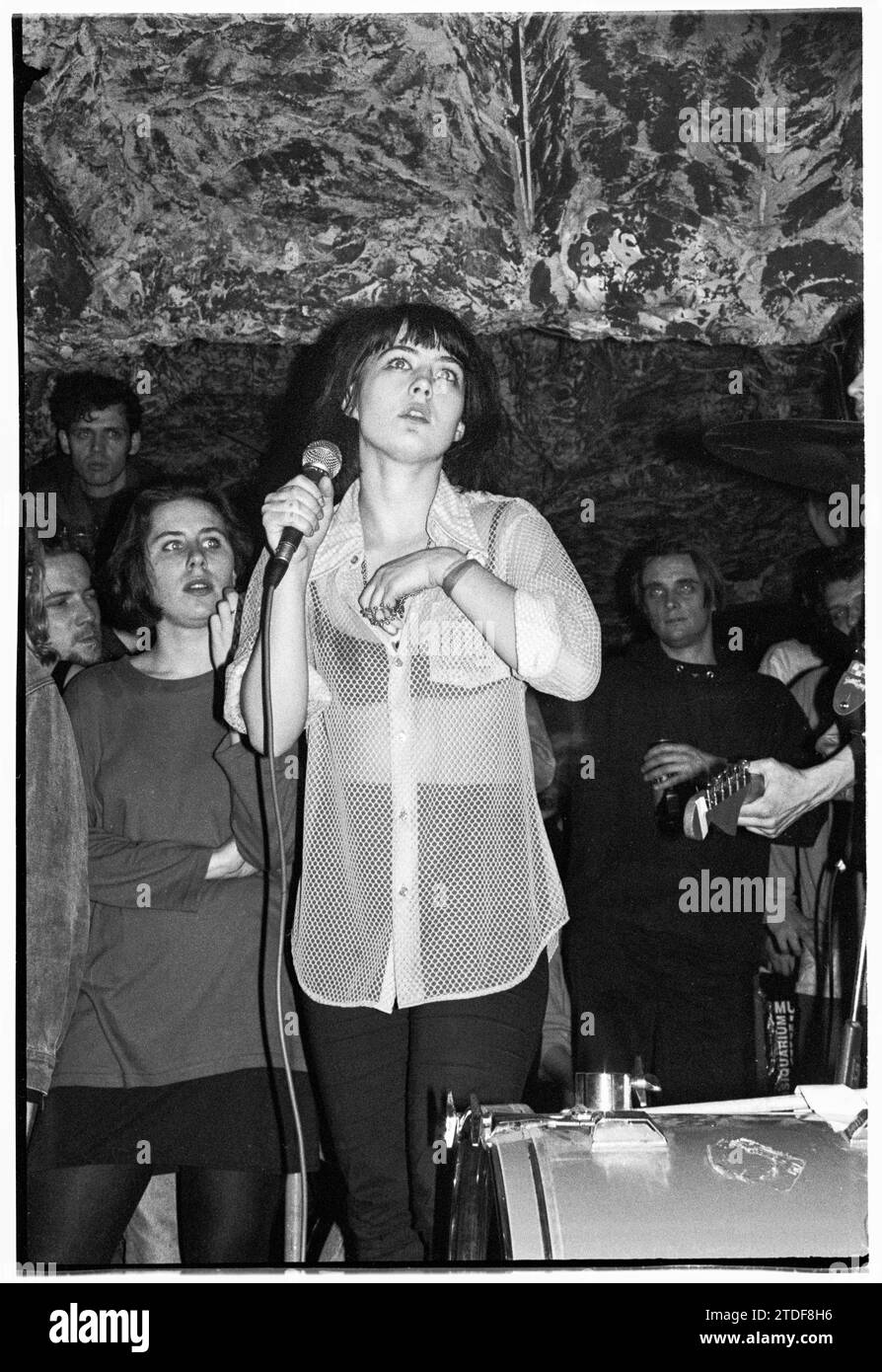 KATHLEEN HANNA, BIKINI KILL, NEWPORT TJS, 1993: Kathleen Hanna the singer of Bikini Kill playing at the Legendary TJs in Newport, Wales, UK on 8 March 1993. This Bikini Kill/Huggy Bear Tour came at the peak of the Riot Grrrl scene and was to promote the two bands combined 1993 album Yeah Yeah Yeah Yeah (Kill Rock Stars). The gig started with a music workshop for women only. Photo: Rob Watkins Stock Photo
