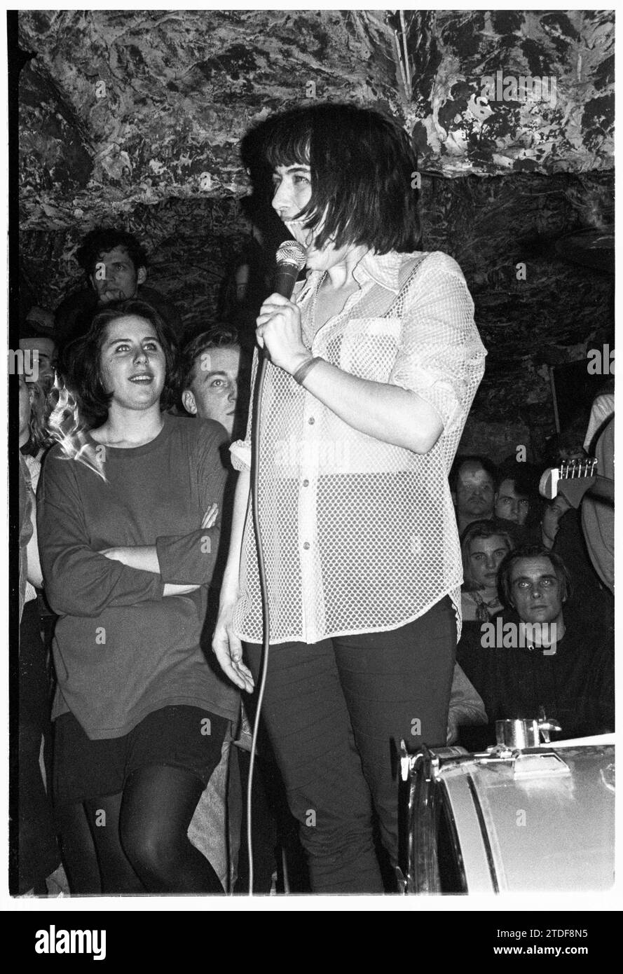 KATHLEEN HANNA, BIKINI KILL, NEWPORT TJS, 1993: Kathleen Hanna the singer of Bikini Kill playing at the Legendary TJs in Newport, Wales, UK on 8 March 1993. This Bikini Kill/Huggy Bear Tour came at the peak of the Riot Grrrl scene and was to promote the two bands combined 1993 album Yeah Yeah Yeah Yeah (Kill Rock Stars). The gig started with a music workshop for women only. Photo: Rob Watkins Stock Photo