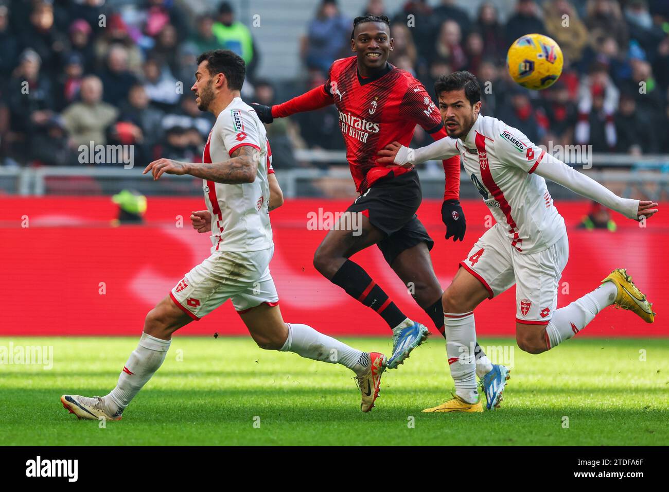 Milan, Italy. 17th Dec, 2023. Rafael Leao of AC Milan (C) seen in action with Andrea Carboni of AC Monza (R) and Pedro Pereira of AC Monza (L) during Serie A 2023/24 football match between AC Milan and AC Monza at San Siro Stadium. FINAL SCOREMilan 3 | 0 Monza Credit: SOPA Images Limited/Alamy Live News Stock Photo
