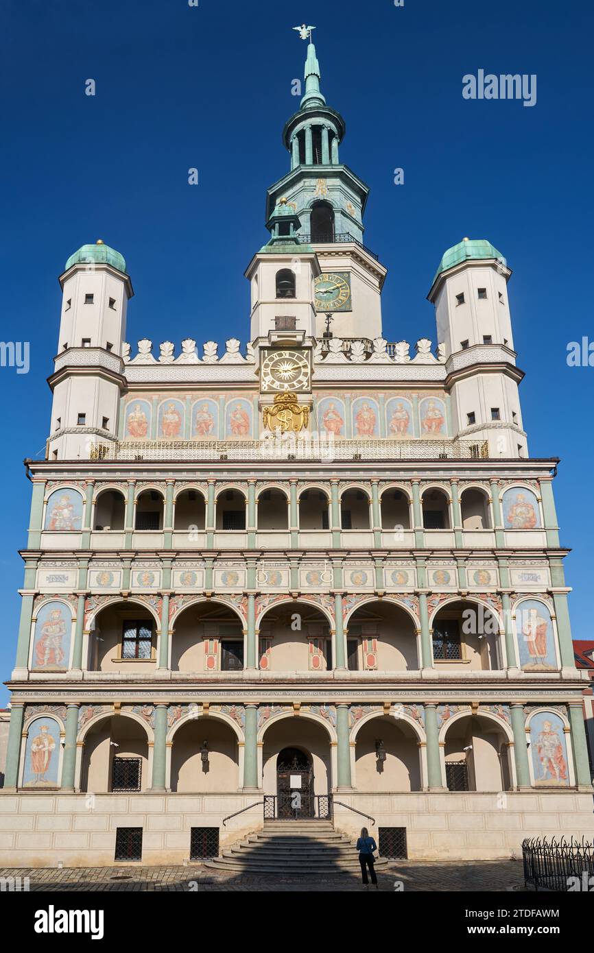 The facade with arcades of the historic Renaissance town hall in Poznan ...