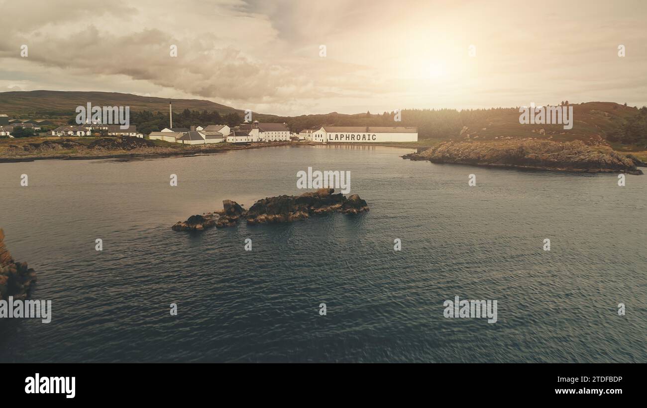 2018.08.07 Laphroaig Whiskey Distillery, Port town Ellen, Islay Island, United Kingdom, Europe. production. Alcohol industry at sun seascape. Alcoholic industry factory, warehouse at sea shore Stock Photo