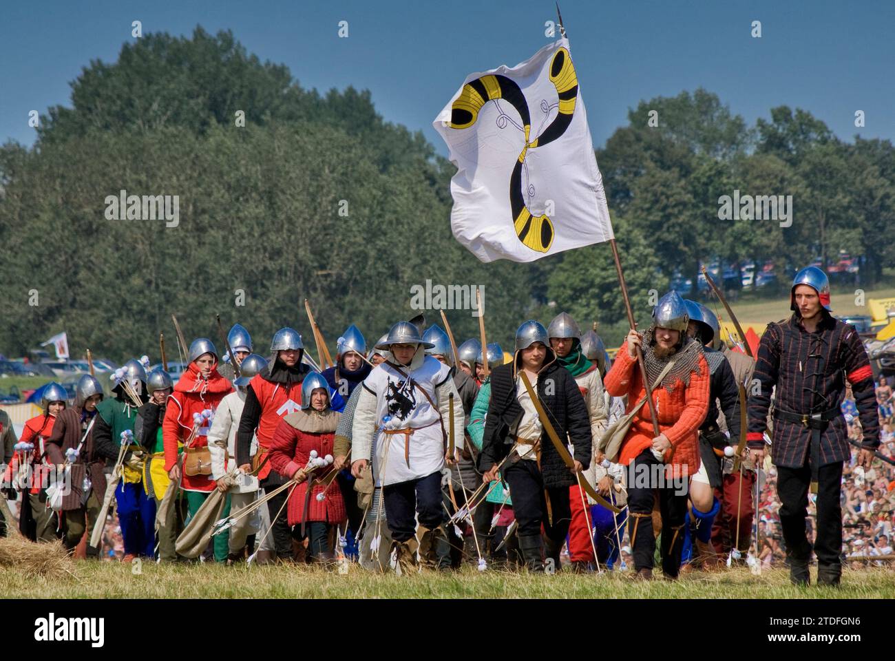 Reenactors leaving battlefield after recreating Battle of Grunwald which took place in 1410 when Polish and Lithuanian troops broke the power of Teutonic Knights, near village of Grunwald Warminsko-Mazurskie, Poland Stock Photo
