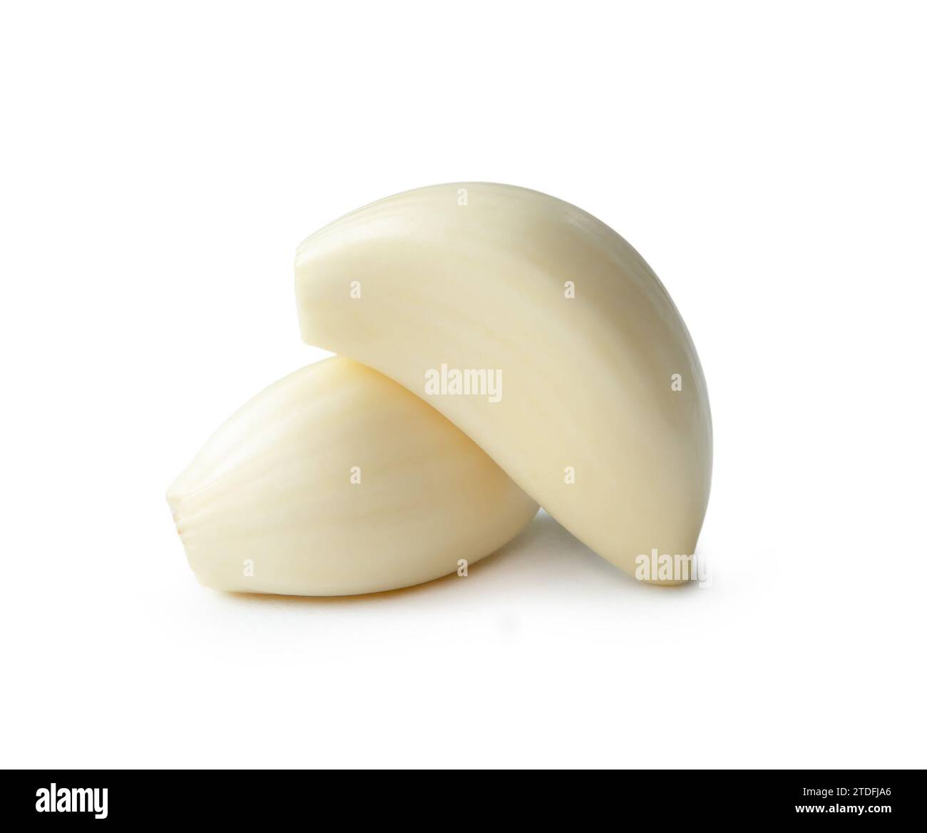 Peeled garlic cloves in stack are isolated on white background with ...