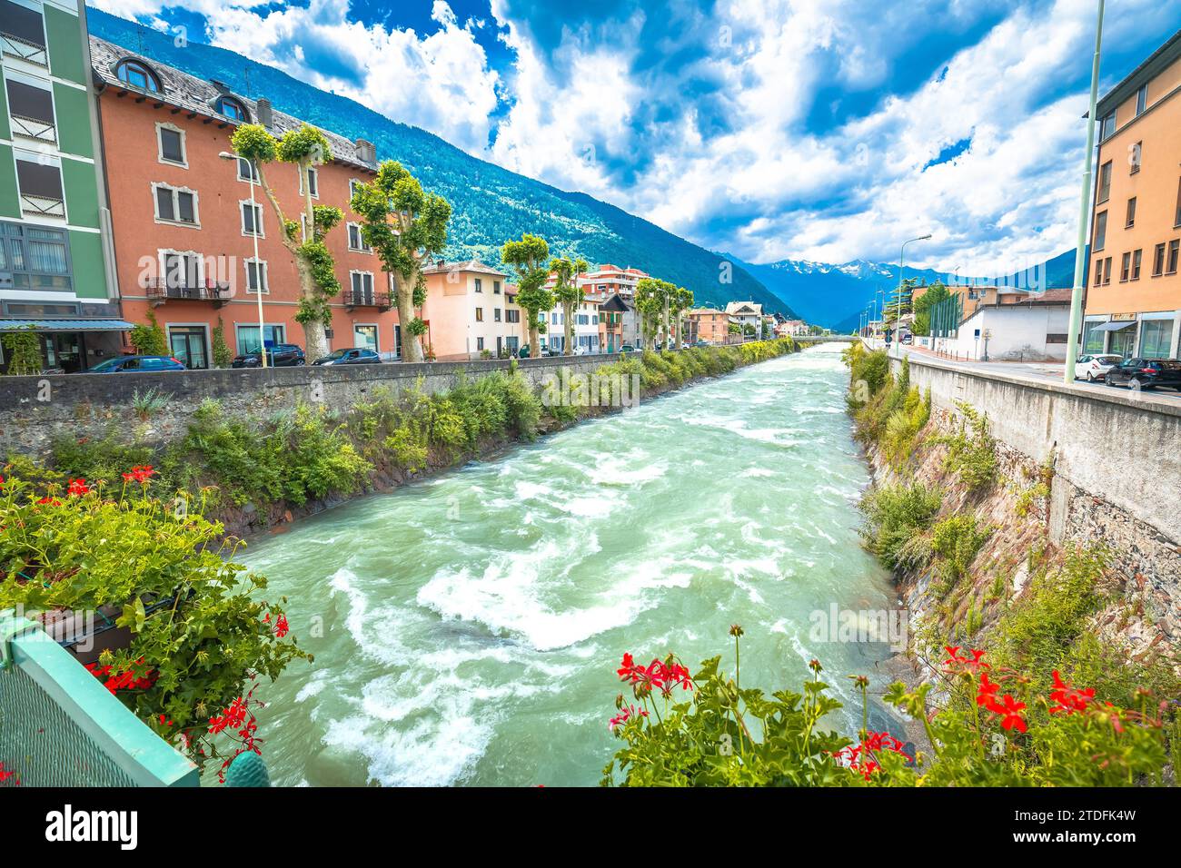 Town of Tirano and Adda river waterfront view, Province of Sondrio, Alps of Italy Stock Photo