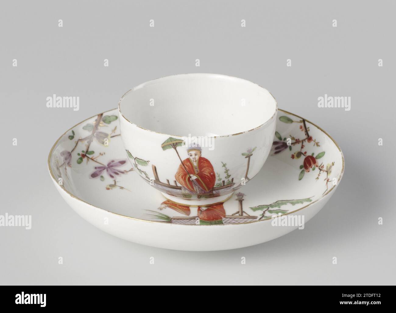 Cup and Saucer, Weesper Porseleinfabriek, c. 1765 - c. 1770 Kop (BK-1982-62-B) and Schotel (BK-1982-62-A), multi-colored decorated with chinoiseries. Golden piping along the edges. Marked with two crossed swords and three bulbs in under -glaze blue. Weesp porcelain Kop (BK-1982-62-B) and Schotel (BK-1982-62-A), multi-colored decorated with chinoiseries. Golden piping along the edges. Marked with two crossed swords and three bulbs in under -glaze blue. Weesp porcelain Stock Photo