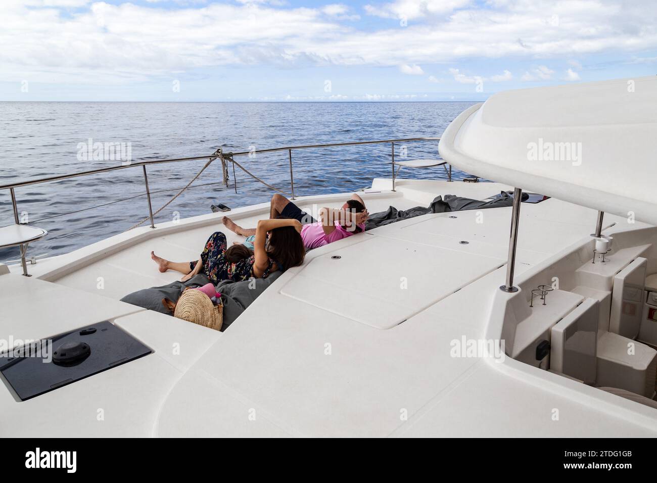 MADEIRA ISLAND, PORTUGAL - AUGUST 25, 2021: An unidentified couple enjoys a boat trip in the Atlantic Ocean off the coast of the island. Stock Photo