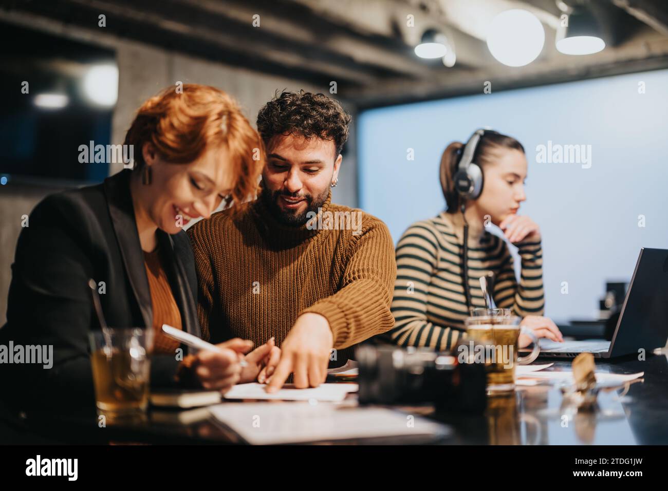 Successful business people collaborating in a corporate office for ...