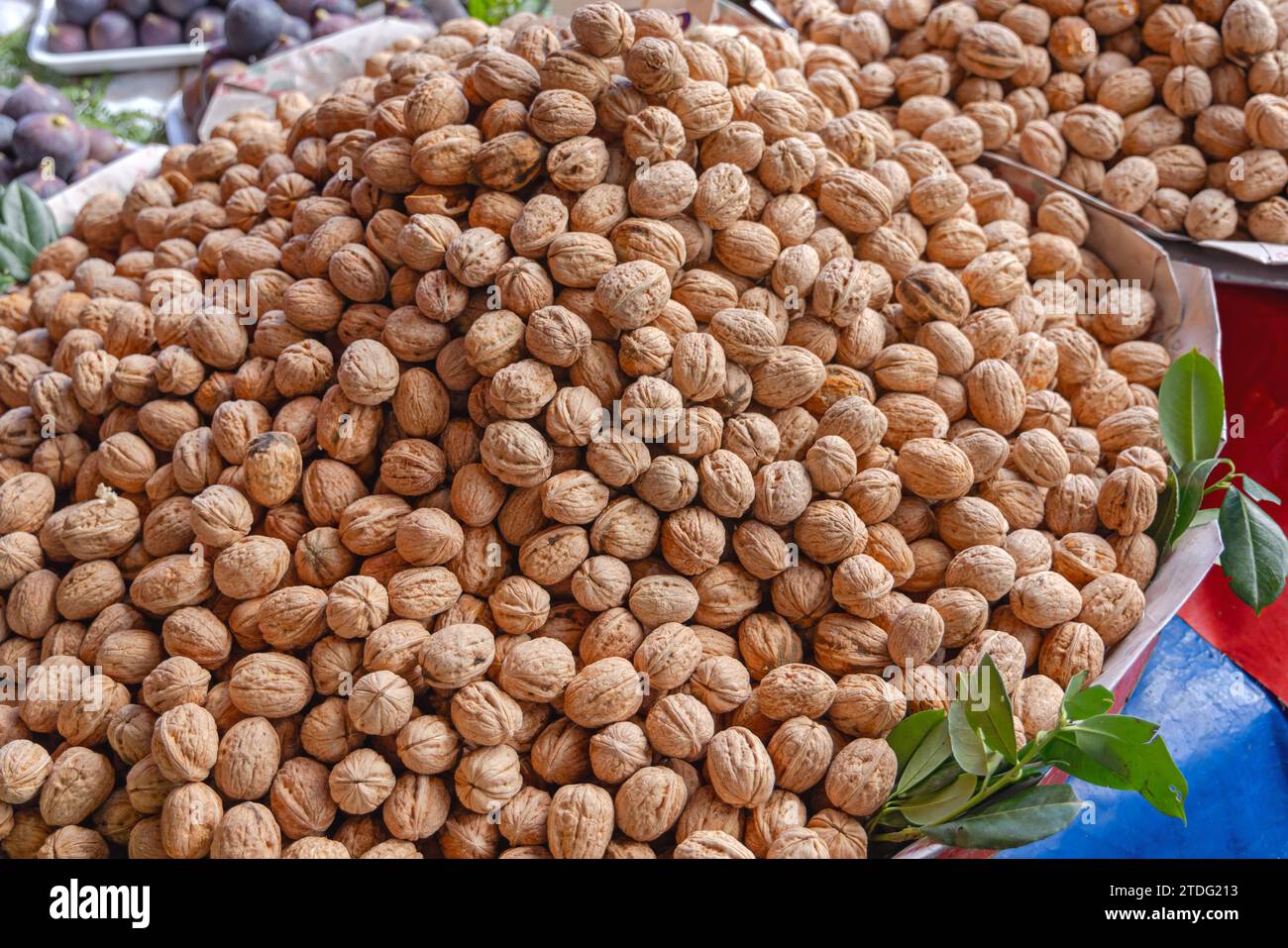 Natural Organic Walnuts Nuts in Shell at Farmers Market Stock Photo
