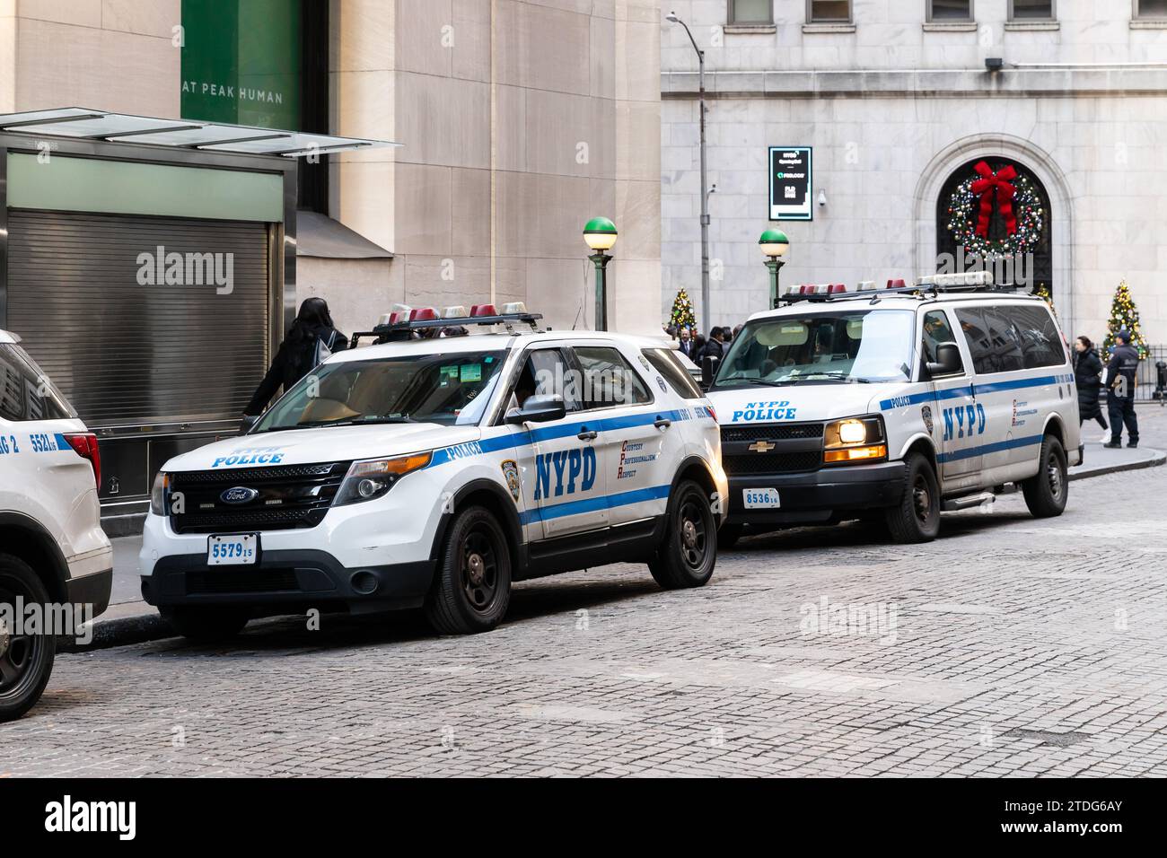 New York Police Department cars sitting outside of the New York Stock