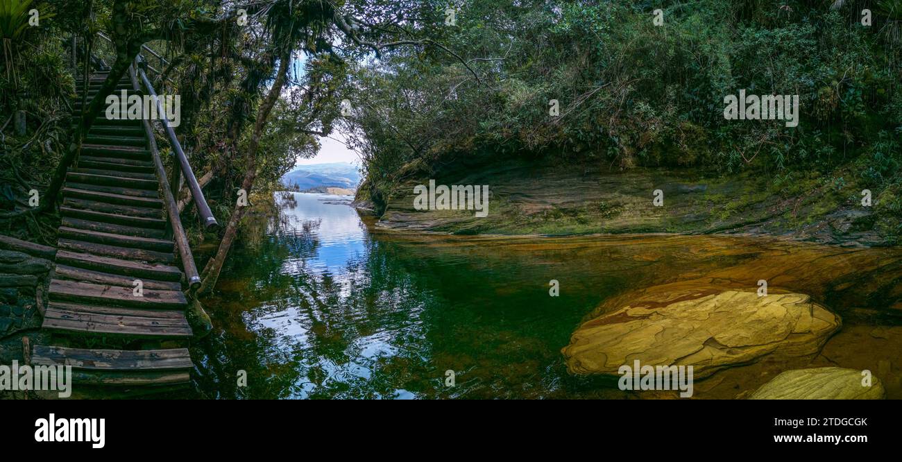 Serene Wooden Stairway Leading to a Calm Lake Cove Stock Photo - Alamy