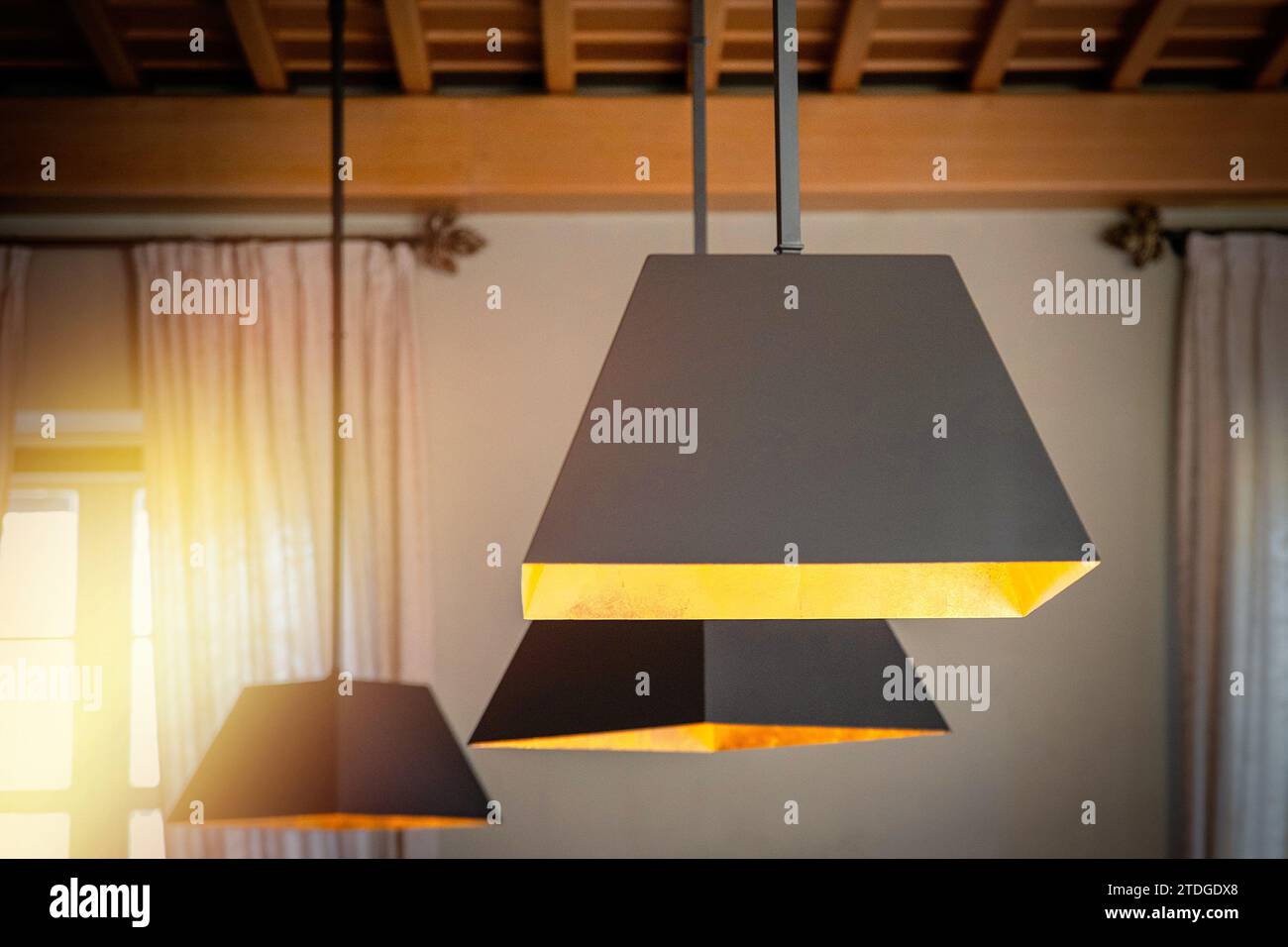 Modern hanging lamps in a classic cozy interior Stock Photo