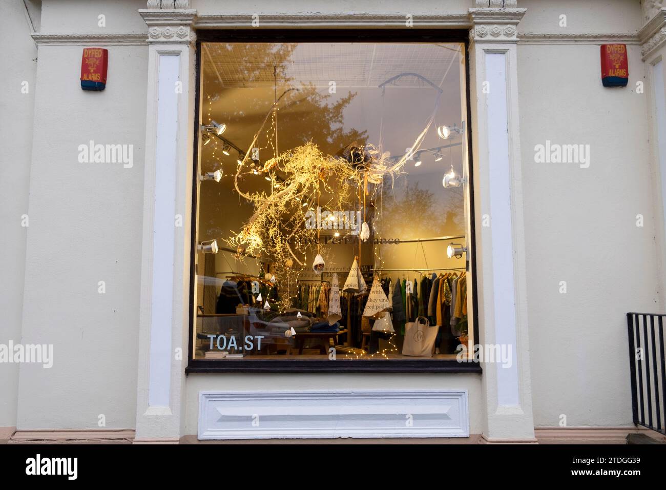 Llandeilo shop TOAST window display at Christmas decorations in winter