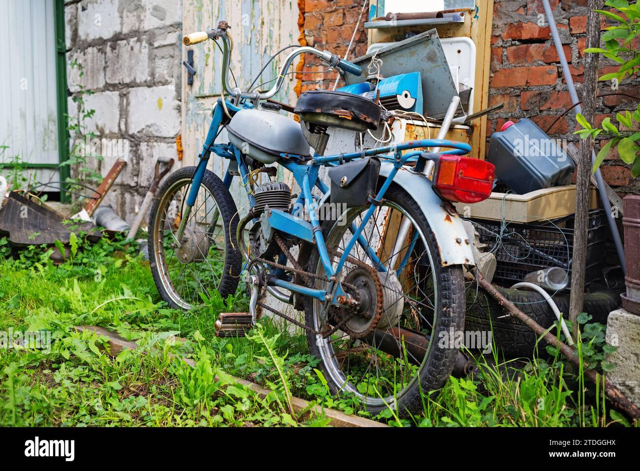 Old vintage retro moped. Scooter vehicle outside. Stock Photo