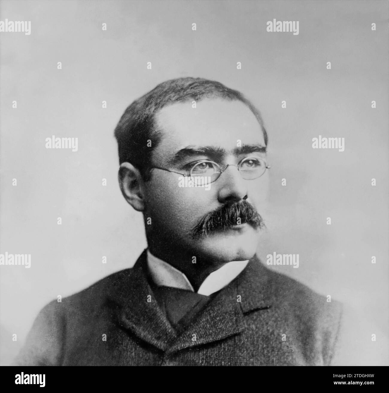 Portrait of Rudyard Kipling. Year: c1895-1900. By Elliot and Fry. Publisher: Bain News Service. Stock Photo