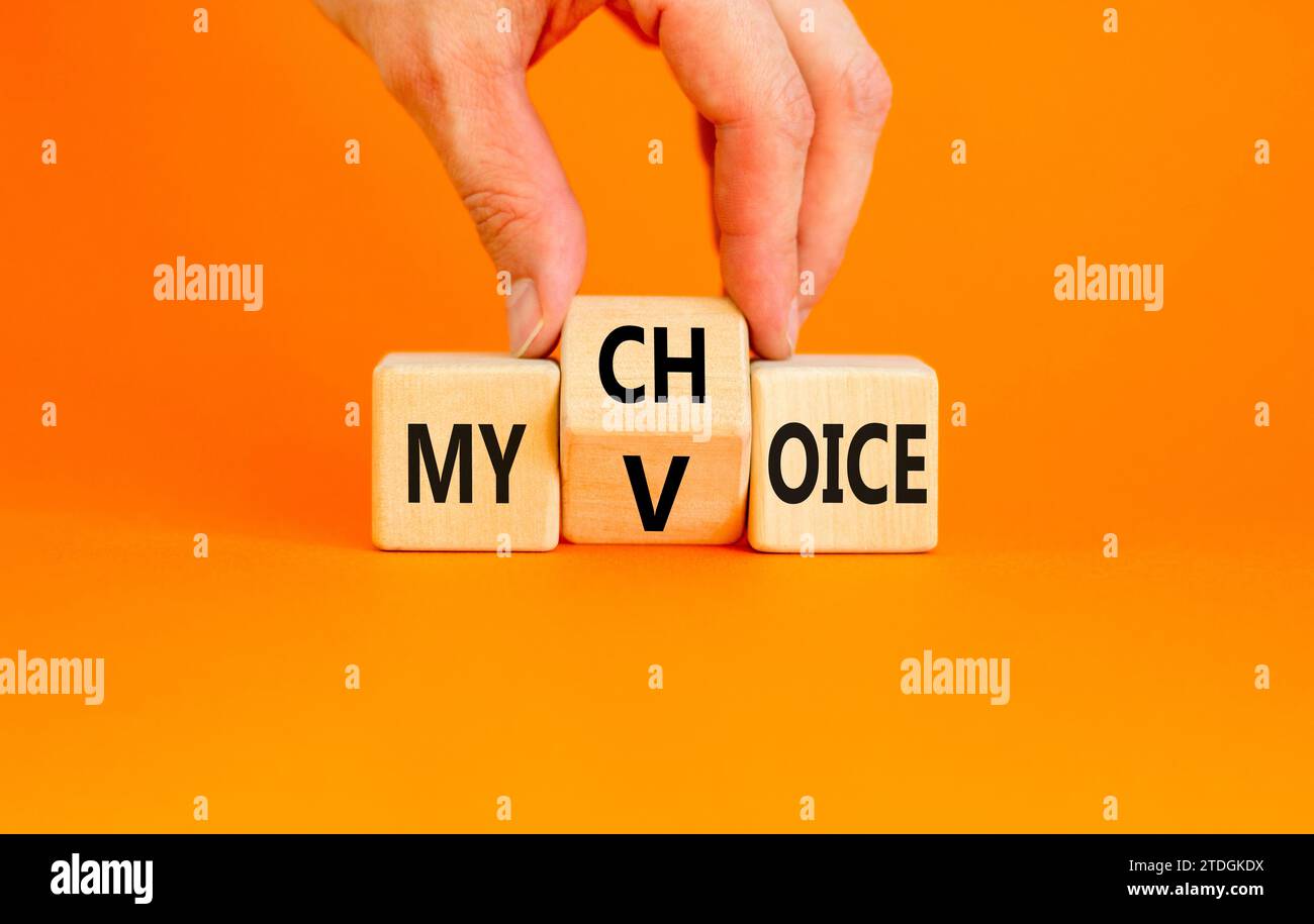My voice choice symbol. Businessman turns wooden cubes and changes the ...