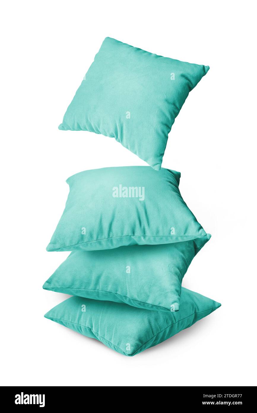 Stack of turquoise pillows isolated on white background. Pile of  decorative cushions for sleeping and resting, home interior, house decor. Stock Photo