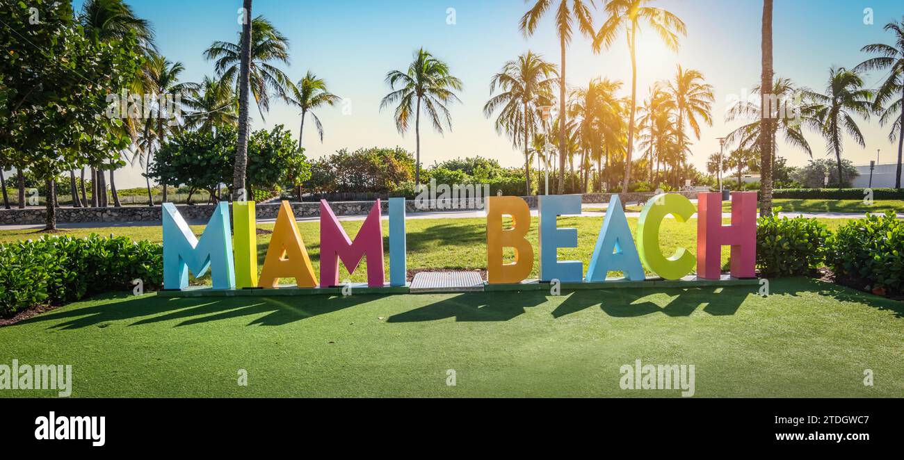 Colorful Miami beach sign in Lummus park at sunset, Miami, Florida. Stock Photo