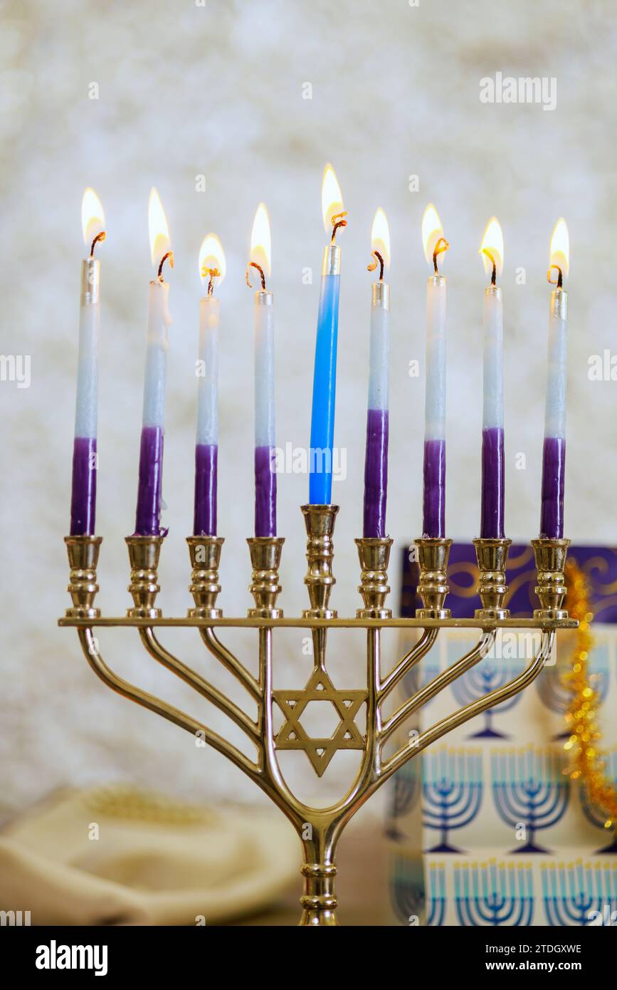 During Hanukkah Hanukkiah Menorah candles is lit as symbol of Jewish
