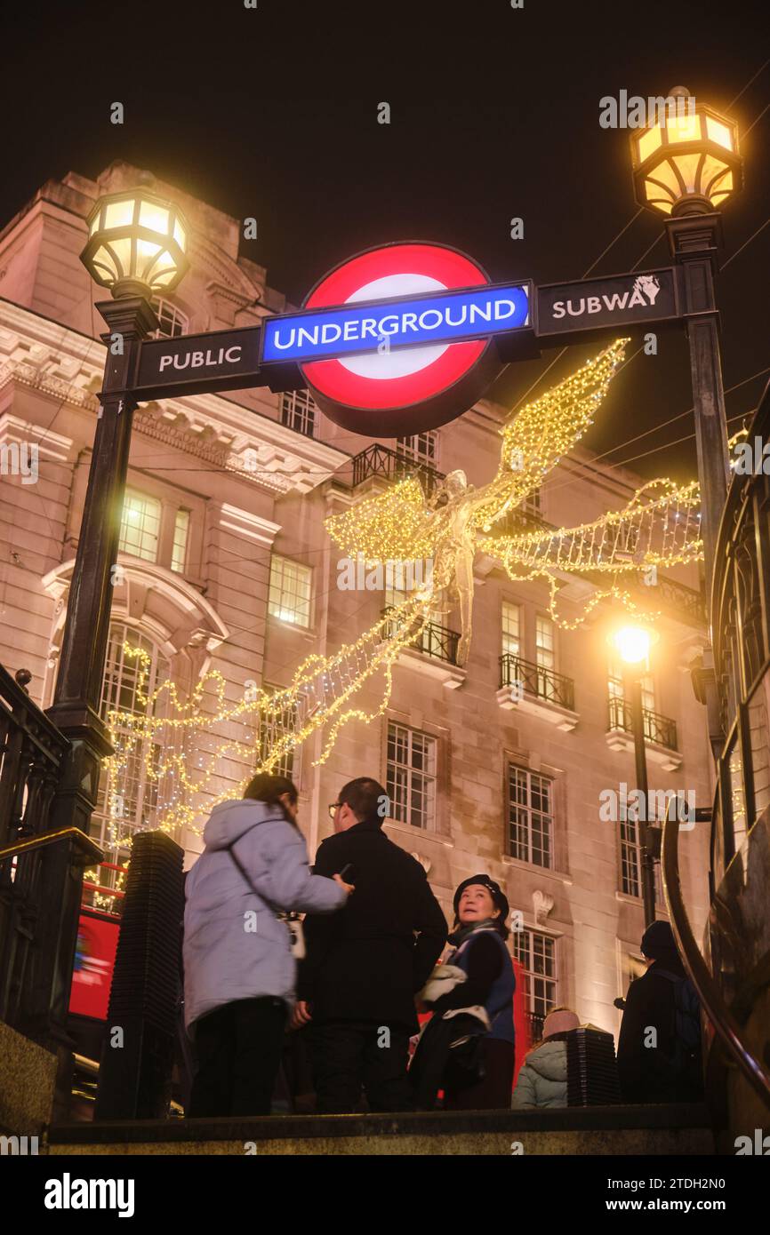 London, United Kingdom - November 16, 2023: Underground Entrance at Piccadilly Circus with Regent's Street illuminations ‘The Spirit of Christmas’ in Stock Photo