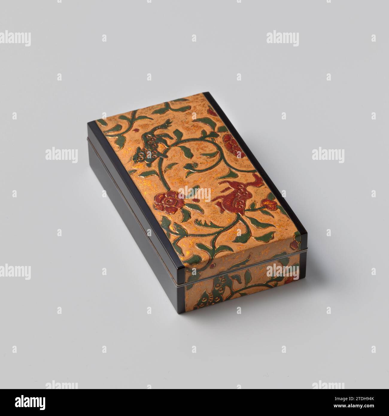Cigarette box with gilt leather, Elongated cigarette box with lid of black  lacquerware with inlaid gold leather with a decoration of stylized lion  dogs (shishi) and peonies in green, red and gold