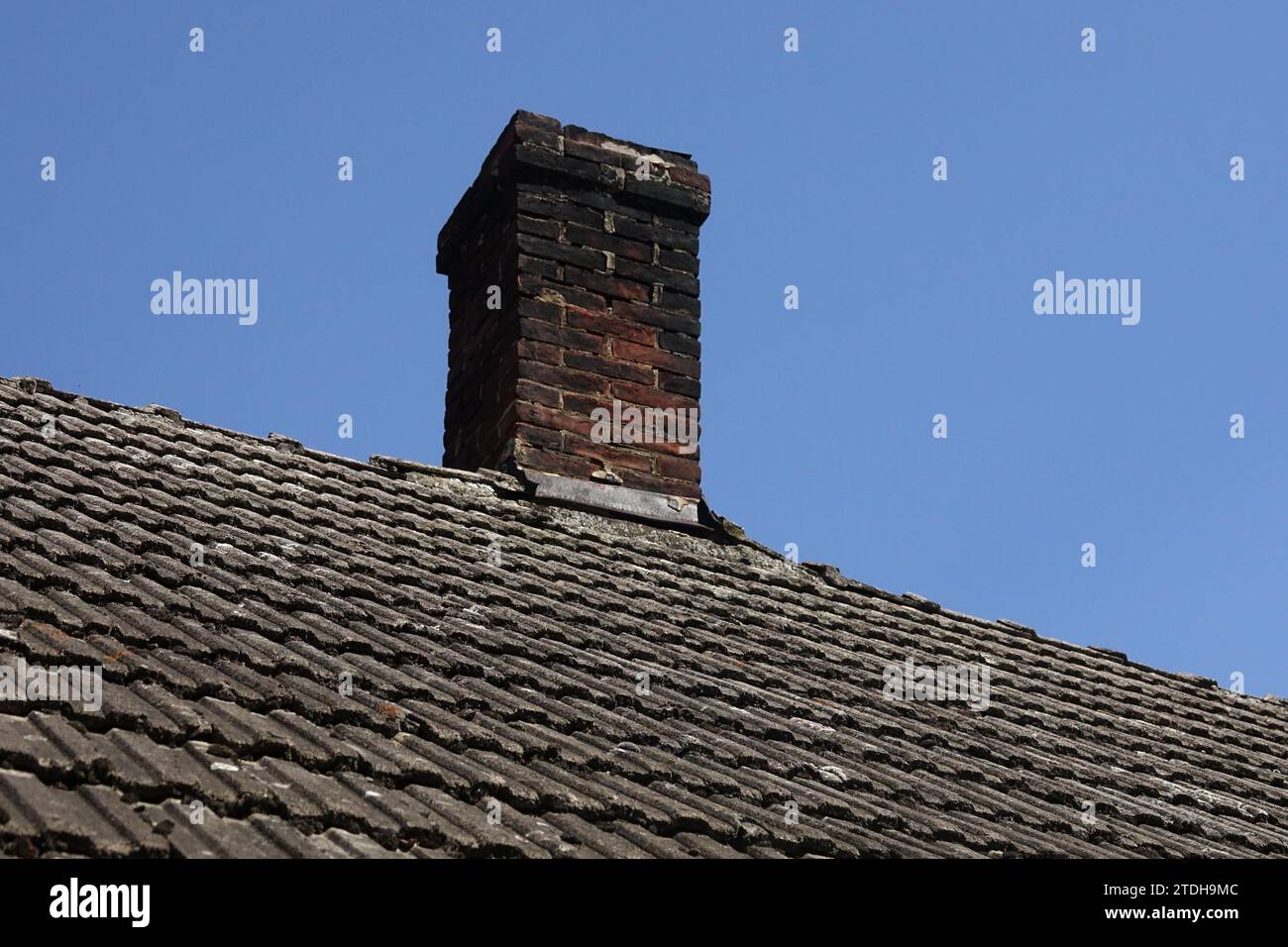brick chimney stack roof tiles Stock Photo