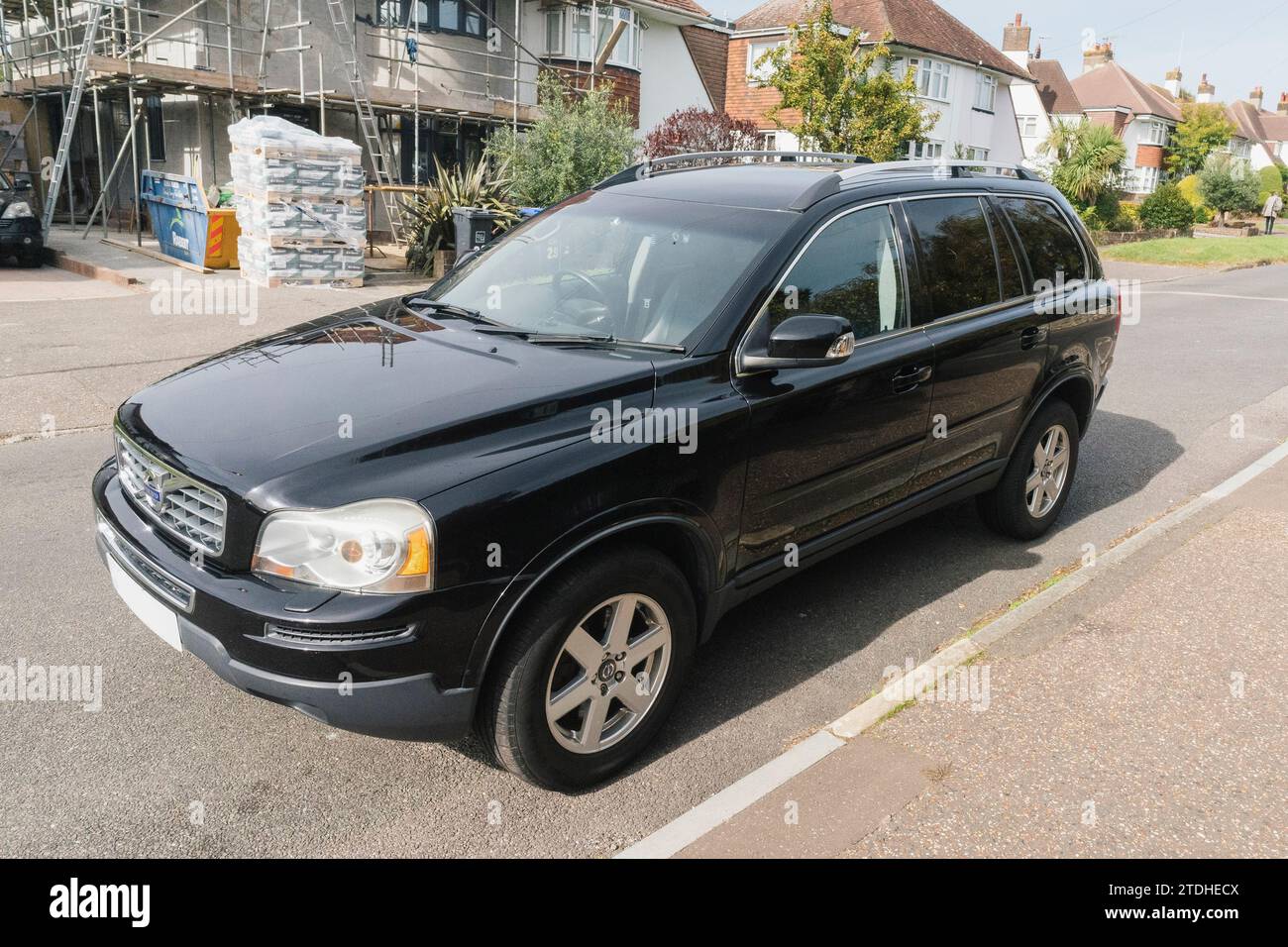 Photos of a large 4x4 Volvo XC90 SUV parked on a suburban British driveway Stock Photo