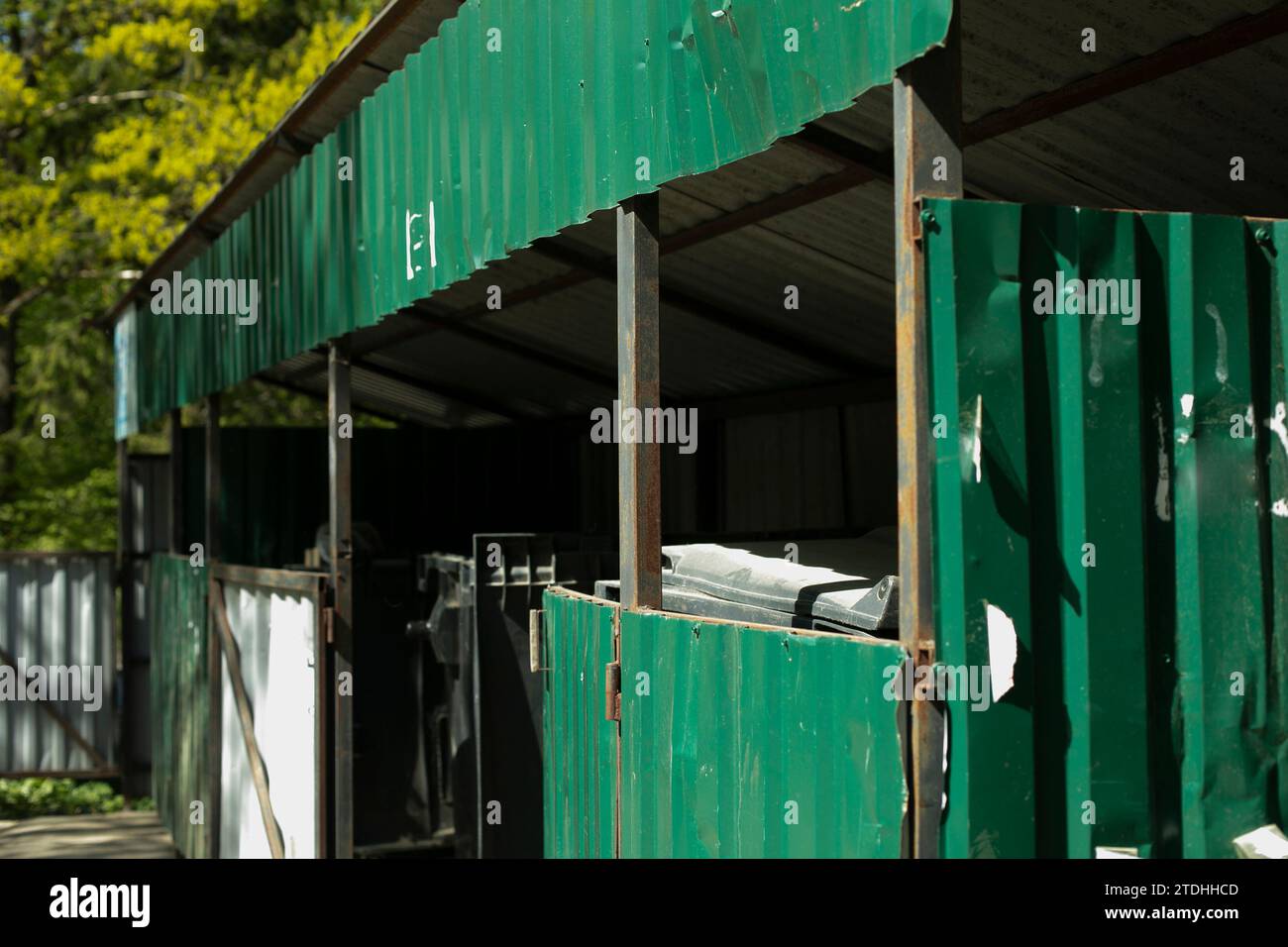 Garbage in city. Place to dispose of garbage. Steel structure for