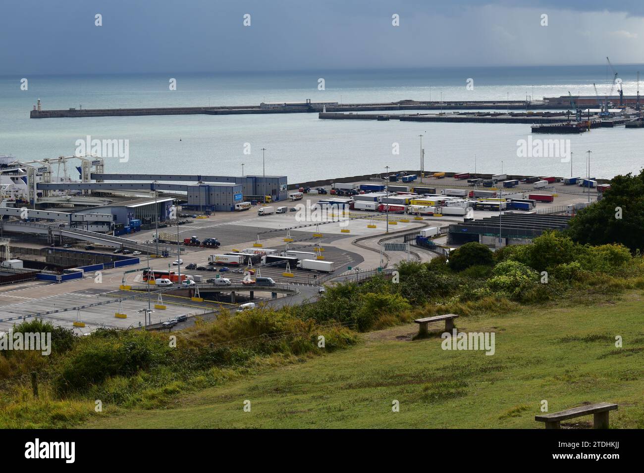 Trucks and cars waiting at the port of Dover before embarking on the ferry that will sail to Calais Stock Photo