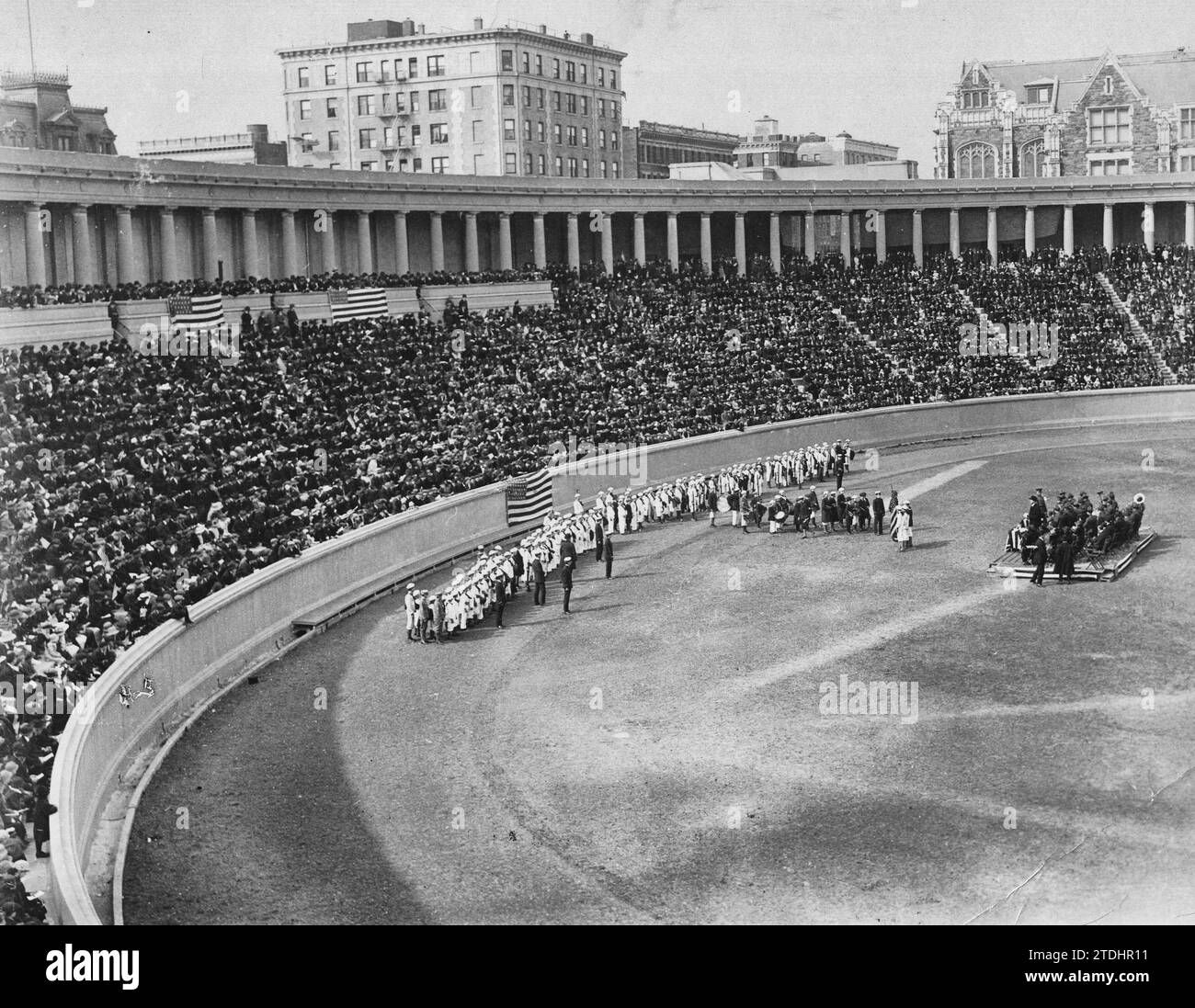 Ceremonies and Parades - Patriotic open air concert at City College Stadium. American Junior naval and Marine Scouts singing 'Yankee Doodle' before immense crowd, 1917 Stock Photo