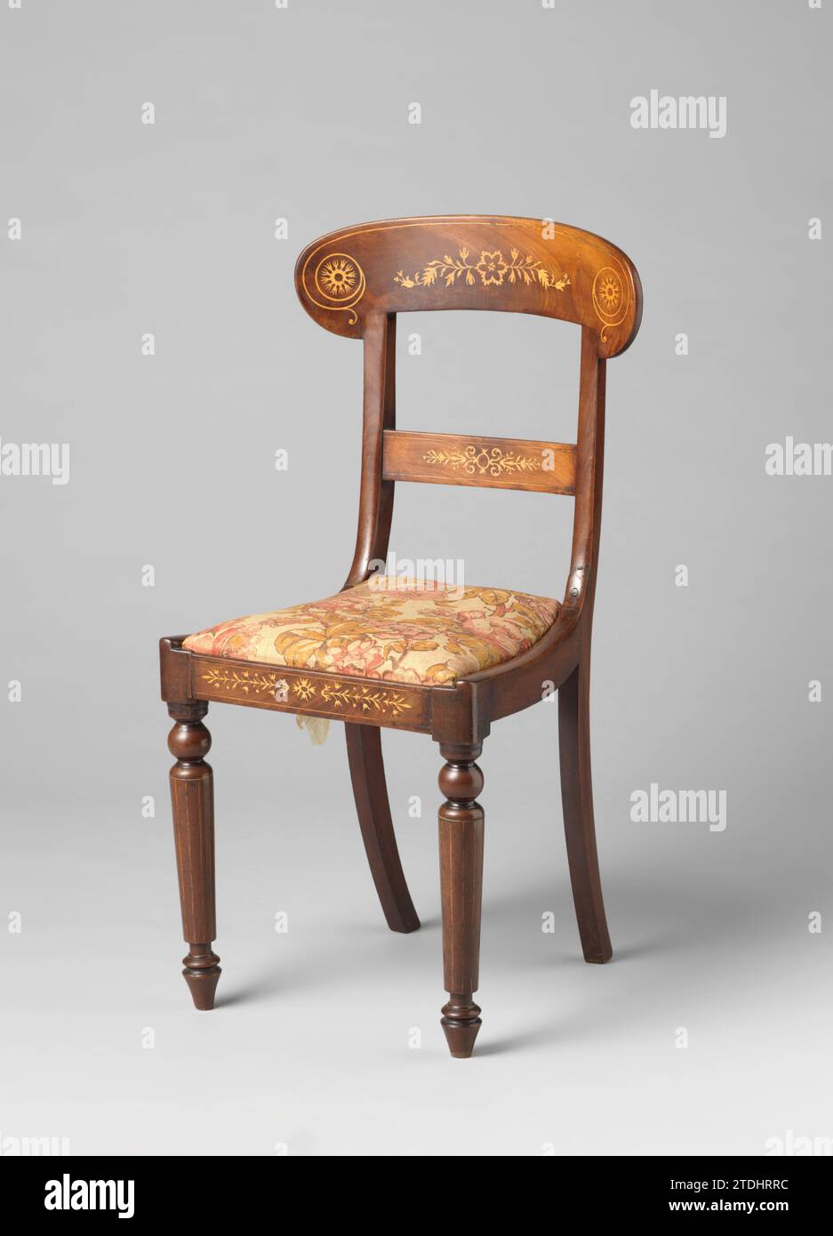 Chair of mahogany, decorated with marquetery of ash wood, the line and ...