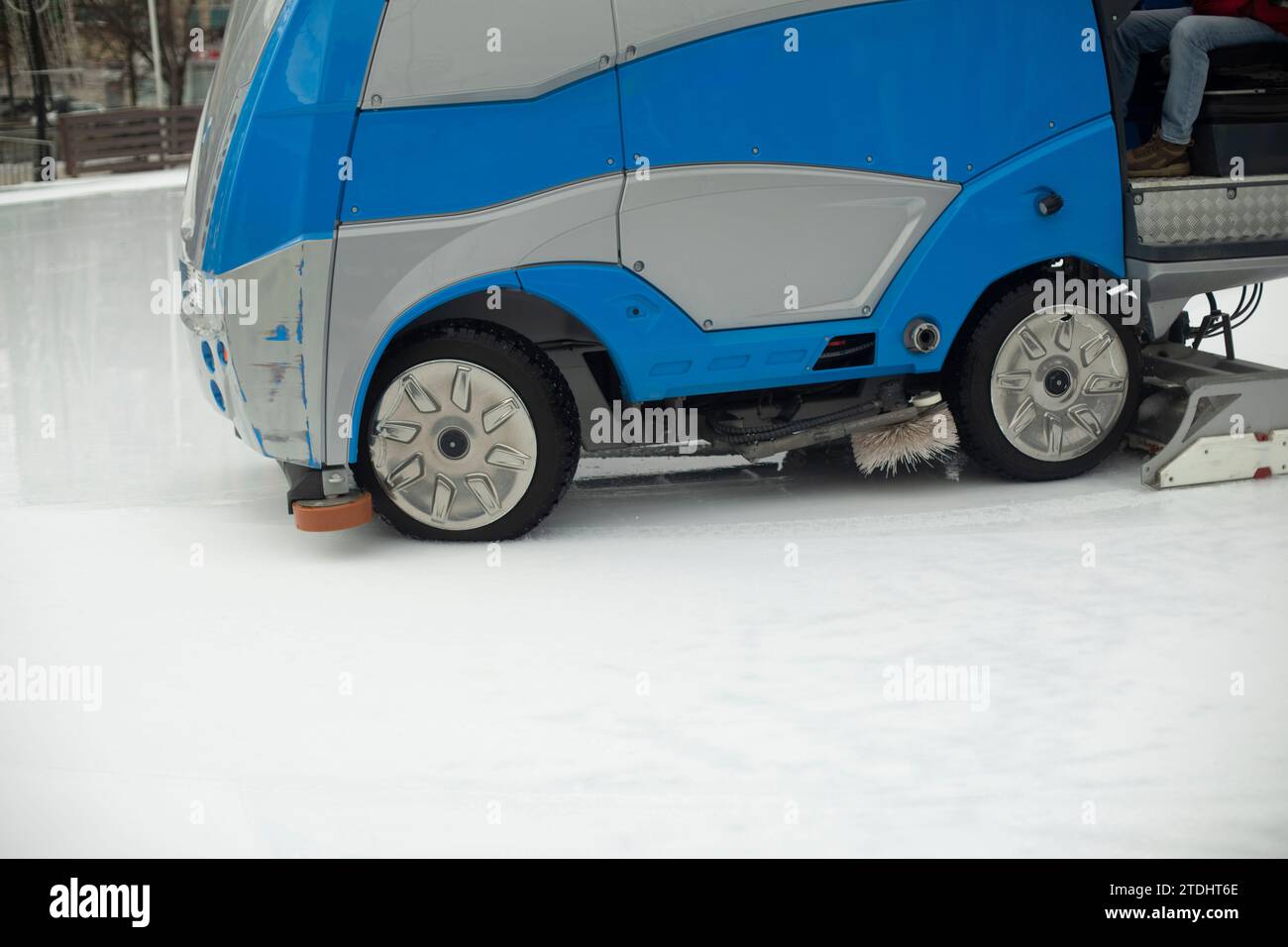 Ice cleaning in the stadium. Ice preparation. Ice Rink Pouring Machine