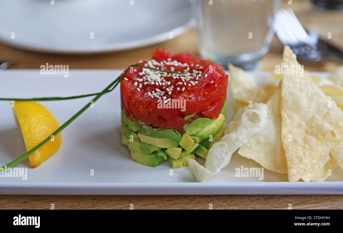 Tuna tartare with avocado chips Stock Photo
