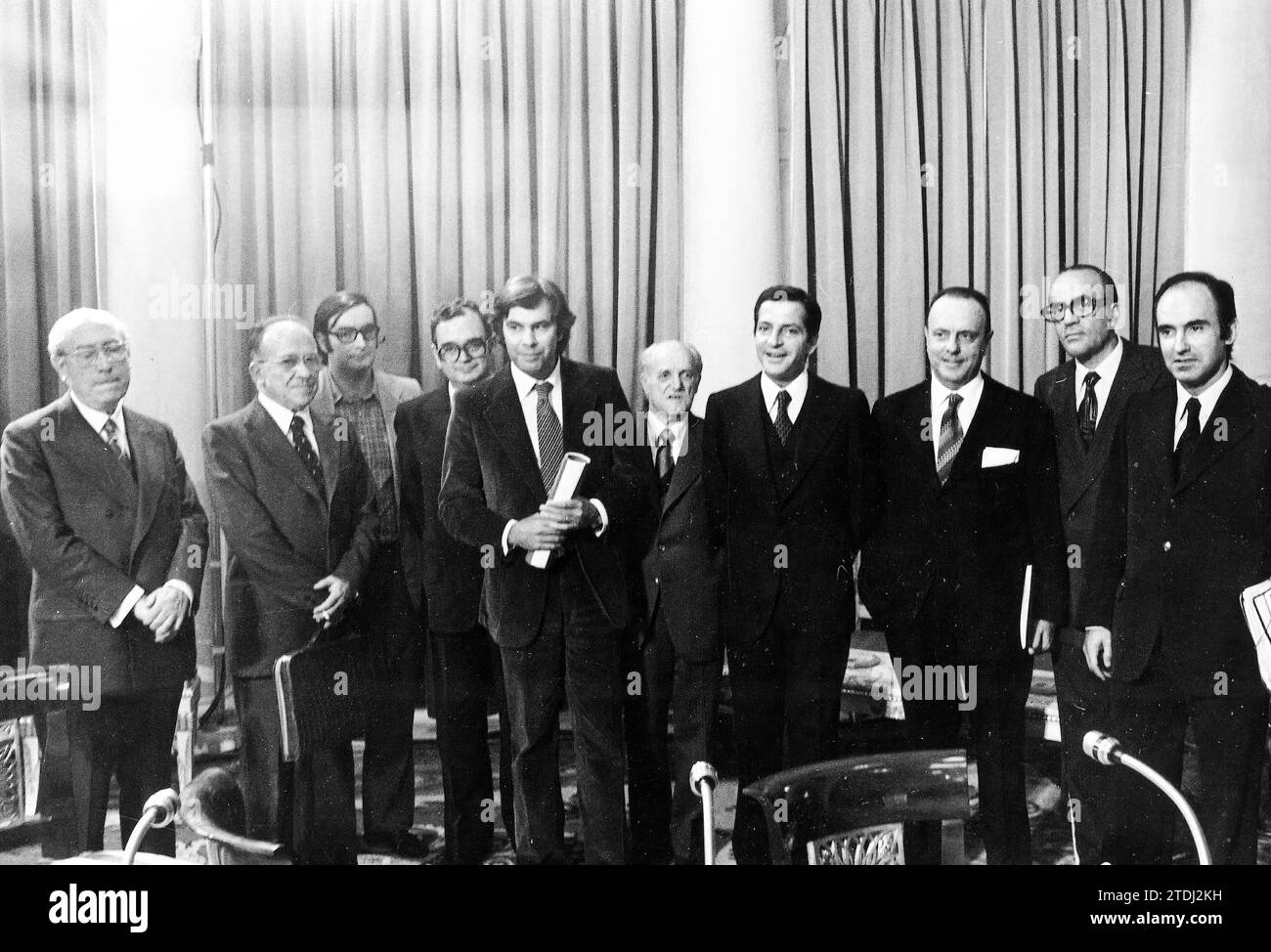 Madrid, 10/25/1977.- The signing of the La Moncloa Pacts contributed to redirecting a climate of concord that had become rarefied in 1977. In the photograph, from left to right: Tierno Galvan, Carrillo, Triginer, Raventós, González , Ajuriaguerra, Adolfo Suárez, Fraga, Calvo Sotelo and Miquel Roca. Credit: Album / Archivo ABC / Luis Alonso Stock Photo