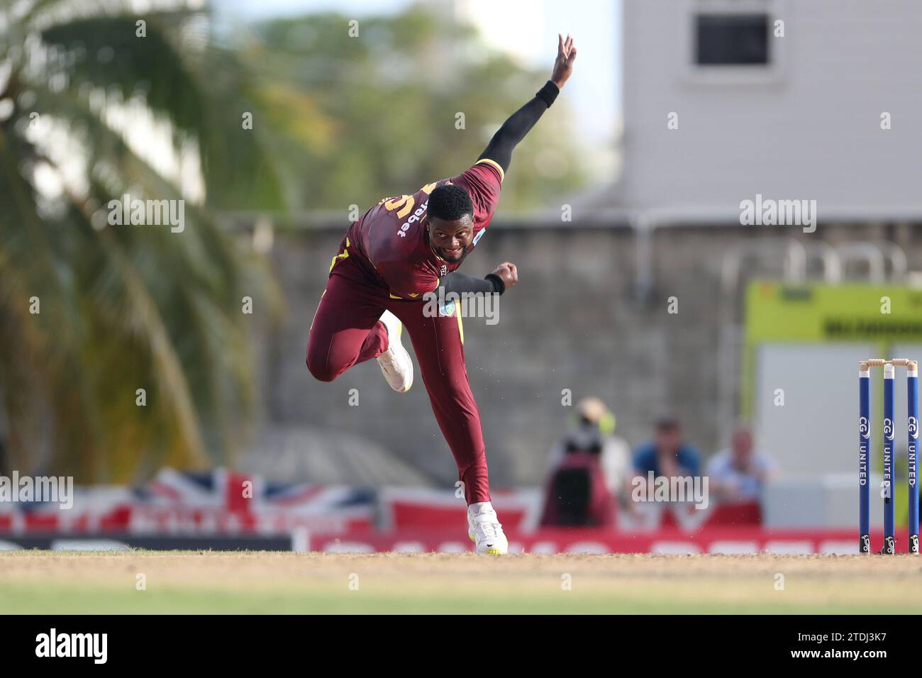 Romario Shepherd of the West Indies bowling during the Third CG United