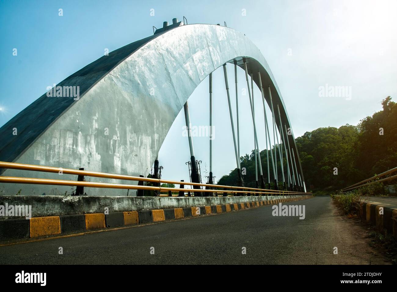 Bajulmati bridge with suspension made of concrete and metal pillars Stock Photo
