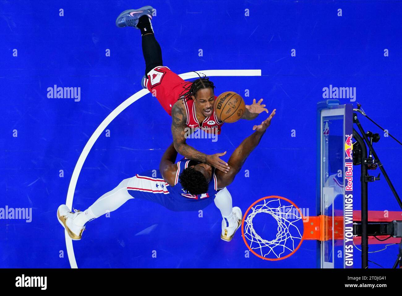 Chicago Bulls' DeMar DeRozan, top, goes up for a shot against