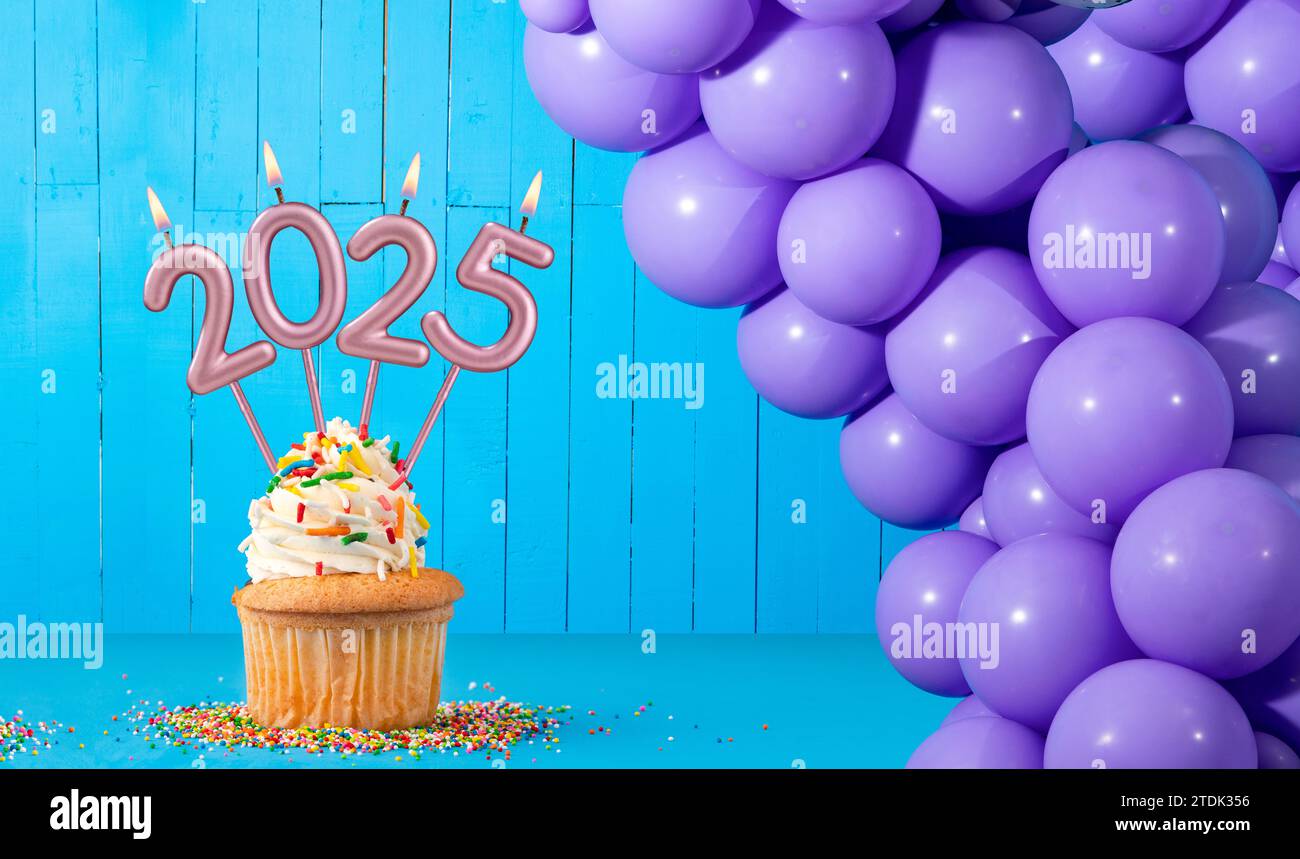 Happy New Year 2025 Candles Cupcake on Blue Background with Balloons